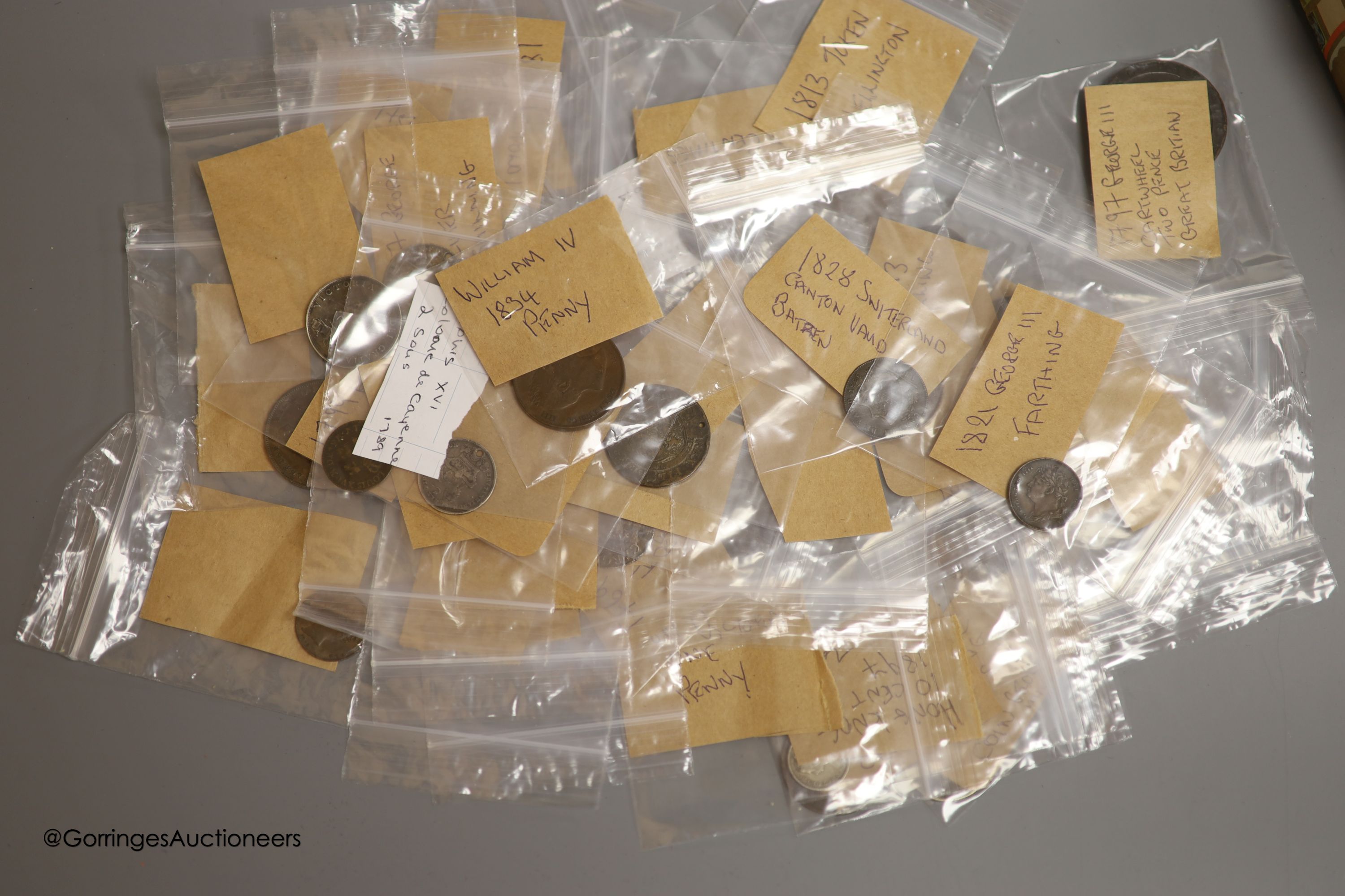 A collection of 18th and 19th century UK and world coins to include: 1834 one penny VF, 1838 farthing AEF, 1855 half penny Good VF, 1826 halfpenny VF and 1848 one penny Good VF